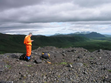 earth scientist mapping in the field