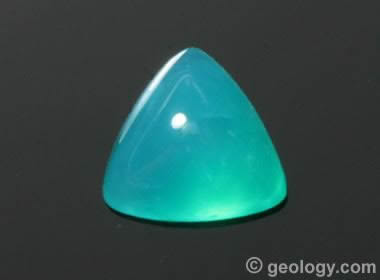 a vivid blue cabochon cut from gem silica