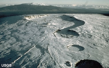Snow-covered Moku'aweoweo Caldera atop Mauna Loa shield volcano