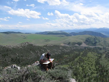 taking field notes at geology field camp