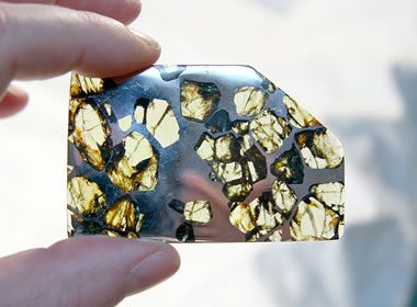 Pallasite meteorite with peridot