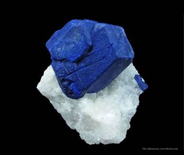 Lazurite crystals on marble -  iRocks