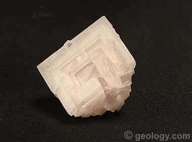 Hopper crystal of pink halite