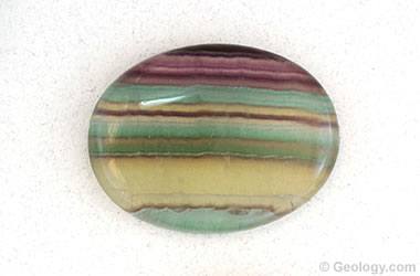 Banded fluorite cabochon