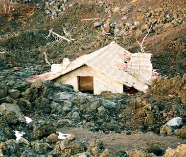house buried by Mt. Etna